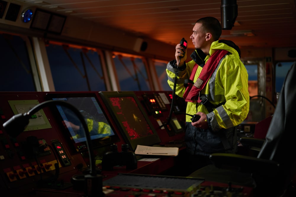 Ships Navigation Officer Navigational Officer Talking On A Radio
